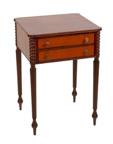 SHERATON MAHOGANY AND MAPLE VENEER TWO-DRAWER STAND Circa 1810 Height 28". Width 20". Depth 18.5".
