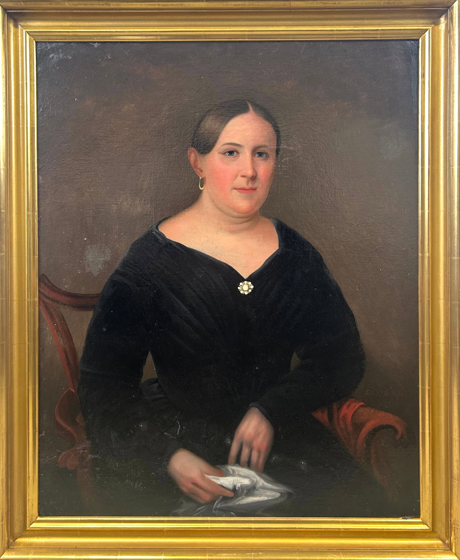 AMERICAN SCHOOL (Mid- to Late 19th Century,), Portrait of a woman seated in a Chippendale chair,: AMERICAN SCHOOL Mid- to Late 19th Century Portrait of a woman seated in a Chippendale chair, holding a handkerchief. Oil on board, 36" x 29". Framed 40.5" x 33.5".