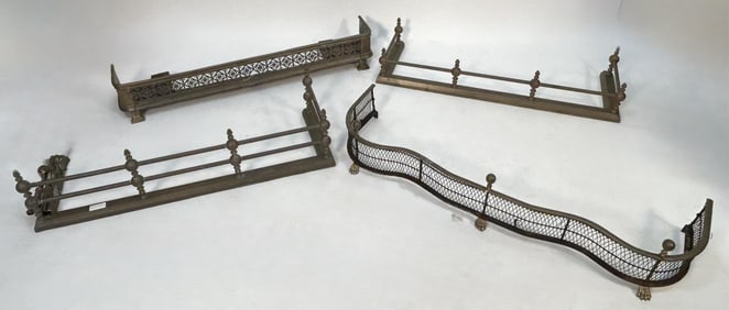 FOUR BRASS FIRE FENDERS 19th Century Lengths from 41" to 47".