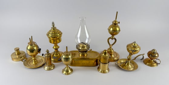 TEN BRASS LAMPS Mostly 19th Century Heights from 2.75" to 10.5".