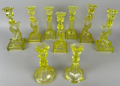 NINE CANARY YELLOW PRESSED GLASS CANDLESTICKS, MOSTLY SANDWICH 19th Century Heights from 7" to 7.5".