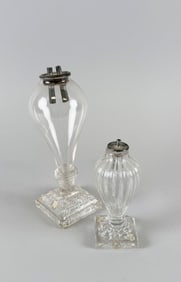TWO SMALL CLEAR GLASS OIL LAMPS Circa 1830 Heights 4.5" and 7.25".