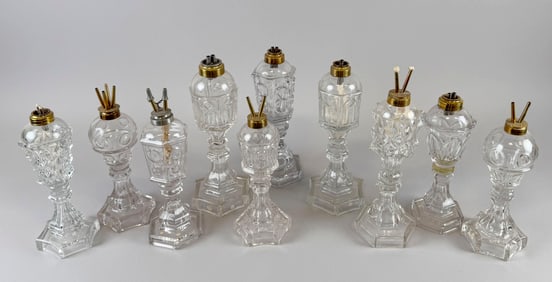 TEN FLINT PATTERN GLASS LAMPS Mid-19th Century Heights from 10.5" to 12.5".