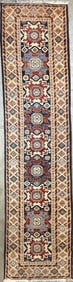 PESHAWAR RUNNER IN CAUCASIAN DESIGN: 2'9" X 11'0" Early 20th Century