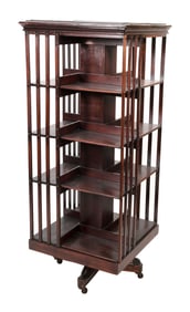 DANNER MAHOGANY REVOLVING BOOKCASE Early 20th Century Height 59". Width 24". Depth 24".