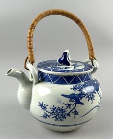 JAPANESE BLUE AND WHITE PORCELAIN TEAPOT Early 20th Century Height 10".