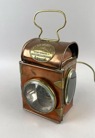 MASON & CO. COPPER AND BRASS LANTERN England, 19th Century Height excluding handle 7.5". Width 5".