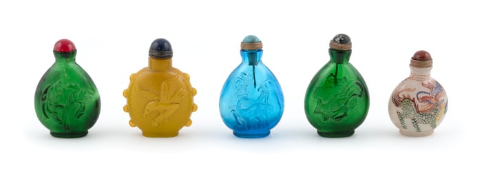 FIVE CLEAR GLASS SNUFF BOTTLES Early 20th Century Heights from 2.5" to 3".