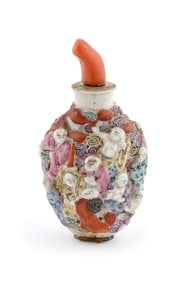 FAMILLE ROSE MOLDED PORCELAIN SNUFF BOTTLE Late 19th Century Height 3".