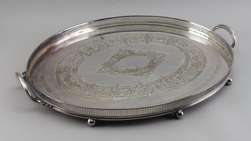 OVAL SILVER PLATED GALLERIED TRAY England, Early 20th Century Height 2". Length 24.75". Width 17.5".