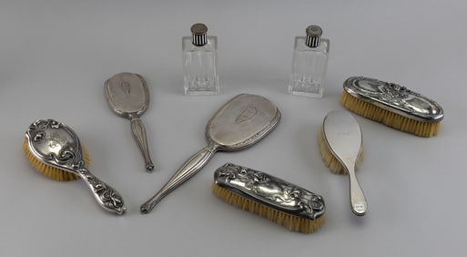ASSEMBLED STERLING SILVER AND SILVER PLATED EIGHT-PIECE DRESSER SET Late 19th/Early 20th Century
