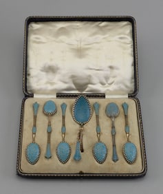 CASED SET OF DAVID ANDERSEN SILVER, GILT AND ENAMEL SPOONS Norway, Circa 1925 Lengths 4" and 4.25".