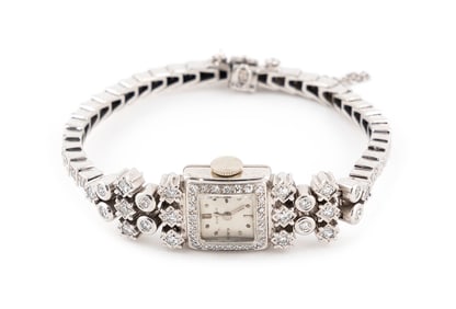 GUBELIN 14KT WHITE GOLD AND DIAMOND WATCH Approx. 20.70 total dwt.