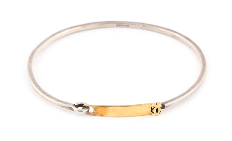 CARTIER 18KT YELLOW GOLD AND STERLING SILVER BANGLE BRACELET Approx. 5.46 total dwt.