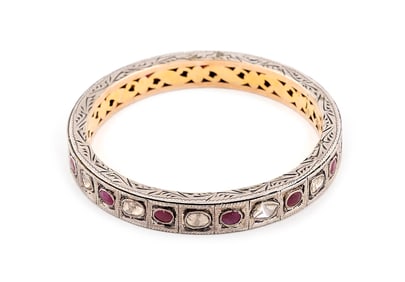 14KT YELLOW GOLD, STERLING SILVER, DIAMOND AND RUBY BRACELET Approx. 26.42 total grams