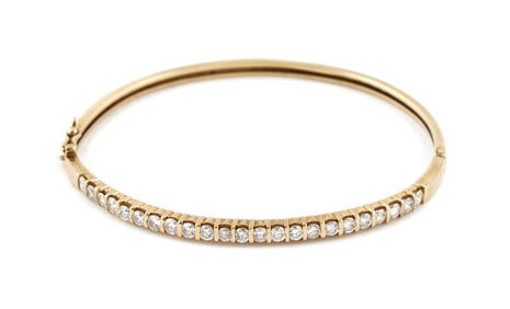 14KT YELLOW GOLD AND DIAMOND BANGLE BRACELET Approx. 6.23 total dwt.