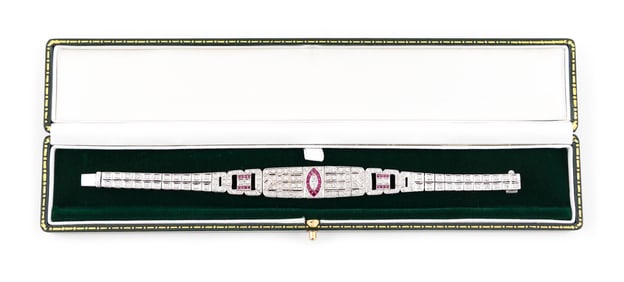18KT WHITE GOLD, DIAMOND AND RUBY BRACELET Approx. 13.56 total dwt.
