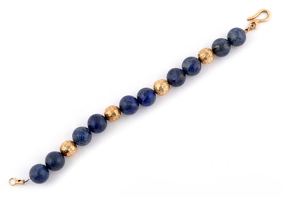 18KT YELLOW GOLD AND LAPIS LAZULI BRACELET Approx. 23.02 total dwt.