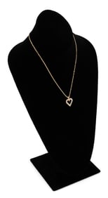 14KT YELLOW GOLD AND DIAMOND HEART PENDANT ON CHAIN Approx. 6.23 total dwt.