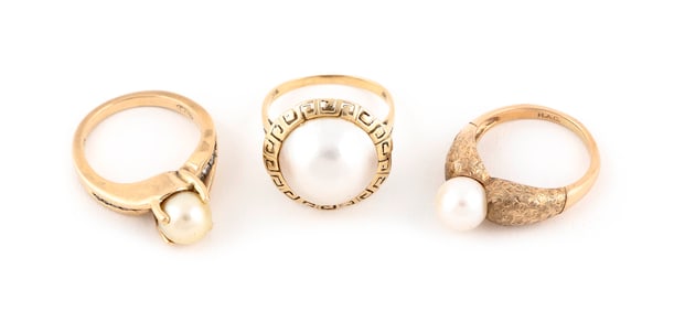 THREE 14KT YELLOW GOLD AND CULTURED PEARL RINGS Approx. 9.38 total dwt.