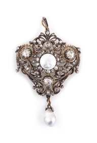 STERLING SILVER AND YELLOW GOLD HAND-CRAFTED BROOCH/PENDANT Approx. 12.47 total dwt.