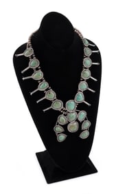 NAVAJO TURQUOISE AND SILVER SQUASH BLOSSOM NECKLACE Early to Mid-20th Century Necklace length 21".