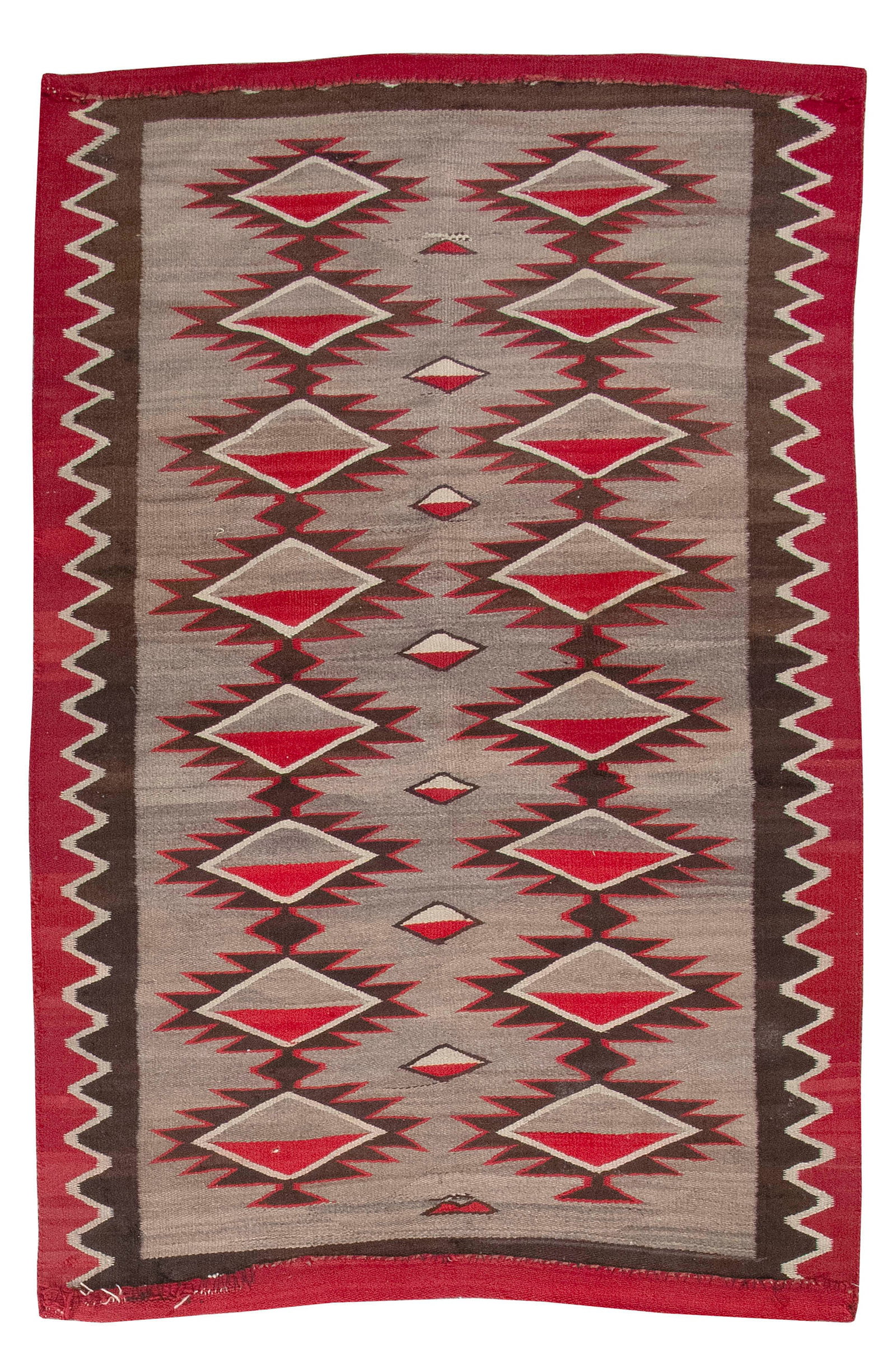 NATIVE AMERICAN RUG Early 20th Century 4'0" x 5'11".: NATIVE AMERICAN RUG Early 20th Century Two columns of red, brown and gray linked medallions traverse a gray field. Red and brown borders. 4'0" x 5'11".