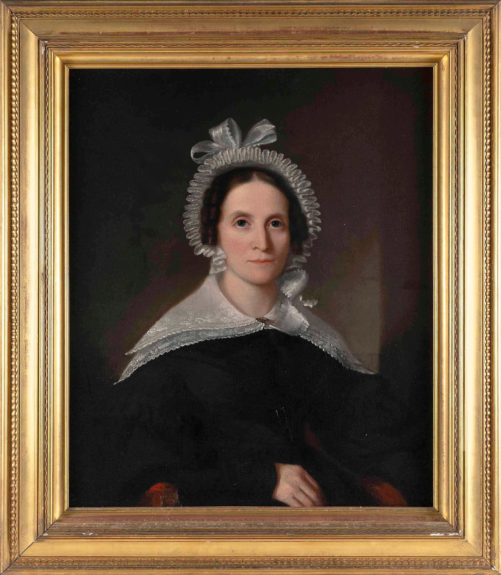 AMERICAN SCHOOL (19th Century,), Portrait of a woman wearing a black dress and a lace shawl and: AMERICAN SCHOOL 19th Century Portrait of a woman wearing a black dress and a lace shawl and bonnet. Unsigned. Oil on canvas, 30" x 25". Framed 39" x 34".