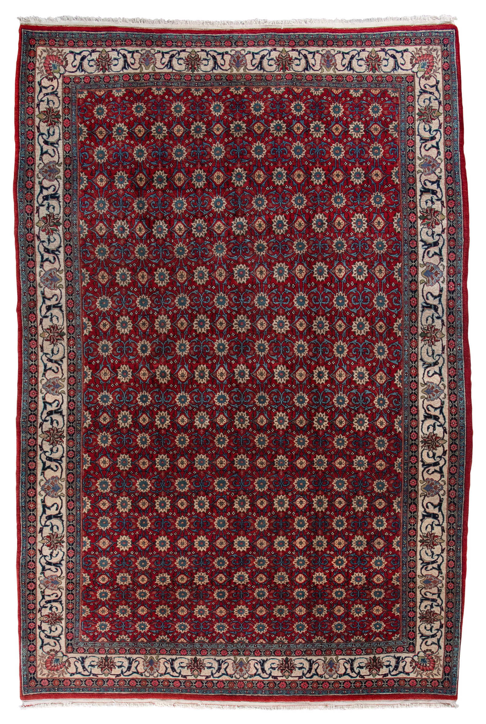 VERAMIN DESIGN RUG: 6'8" X 10'0" Second Half of the 20th Century: VERAMIN DESIGN RUG: 6'8" X 10'0" Second Half of the 20th Century Deep scarlet red field is traversed by ivory, marine blue, pale yellow and subtle tan stylized blossoms suspended from a gracefully cur