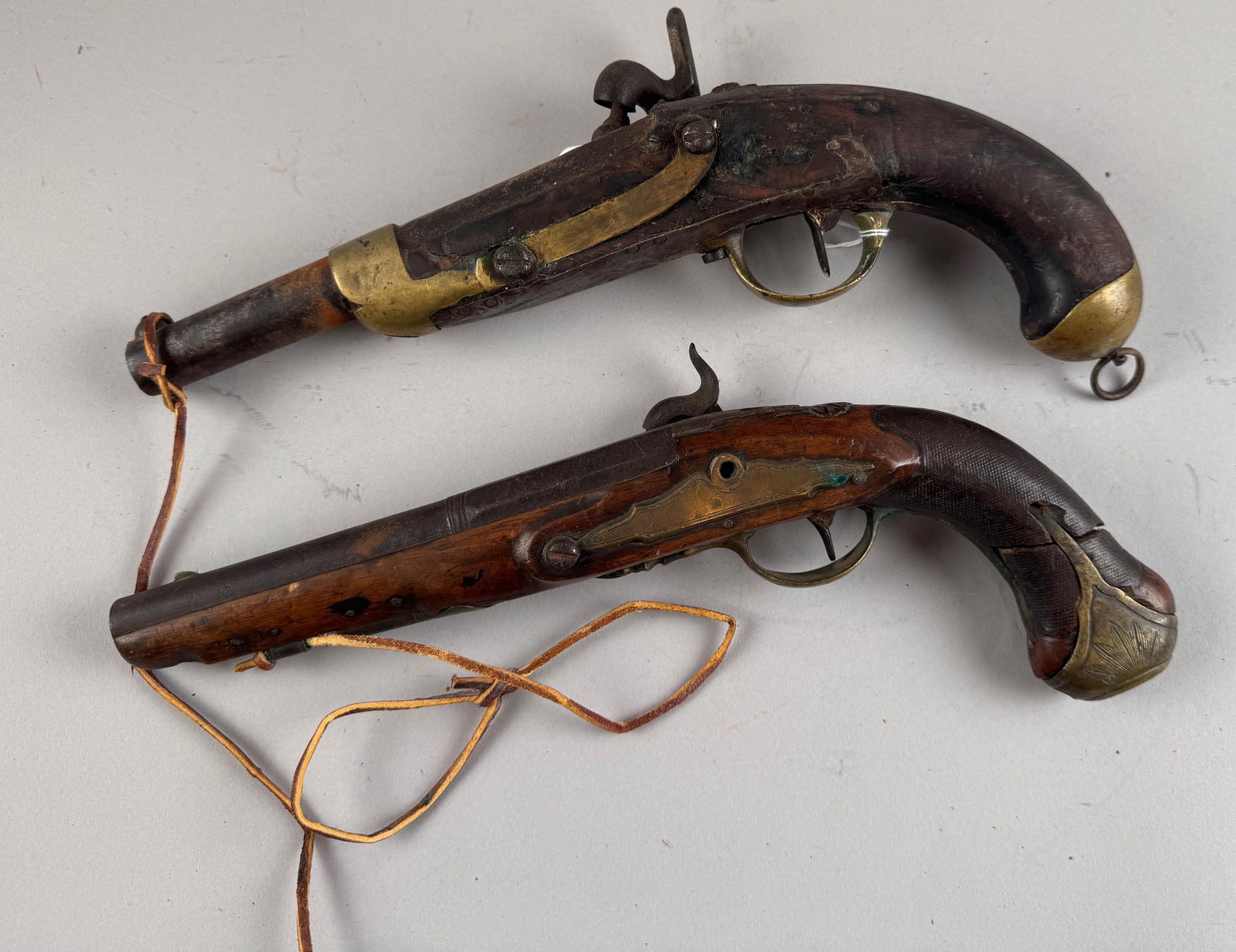 TWO EUROPEAN PERCUSSION PISTOLS 19th Century Lengths 13" and 14". (1 of 2)