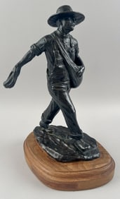 PAUL MOORE (Oklahoma/New Mexico, 1957-), "The Seed Sower"., Bronze on wood base, height 13". Base
