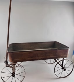 TIN CHILD'S WAGON Late 19th Century Length 36".