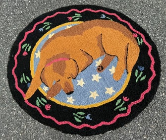 HOOKED WOOL RUG DEPICTING A SLEEPING BROWN DOG India, 20th Century Diameter 36".