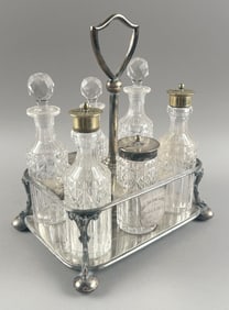 COOPER BROTHERS & SONS SILVER PLATED AND CRYSTAL CRUET SET England, Circa 1898 Height 10.5". Width