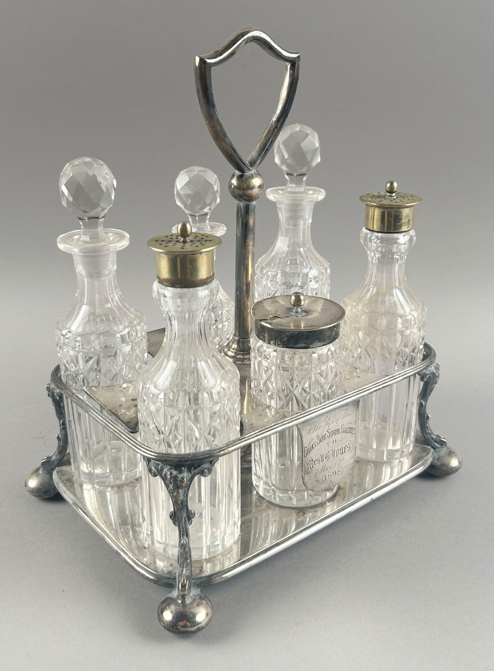 COOPER BROTHERS & SONS SILVER PLATED AND CRYSTAL CRUET SET England, Circa 1898 Height 10.5". Width (1 of 2)