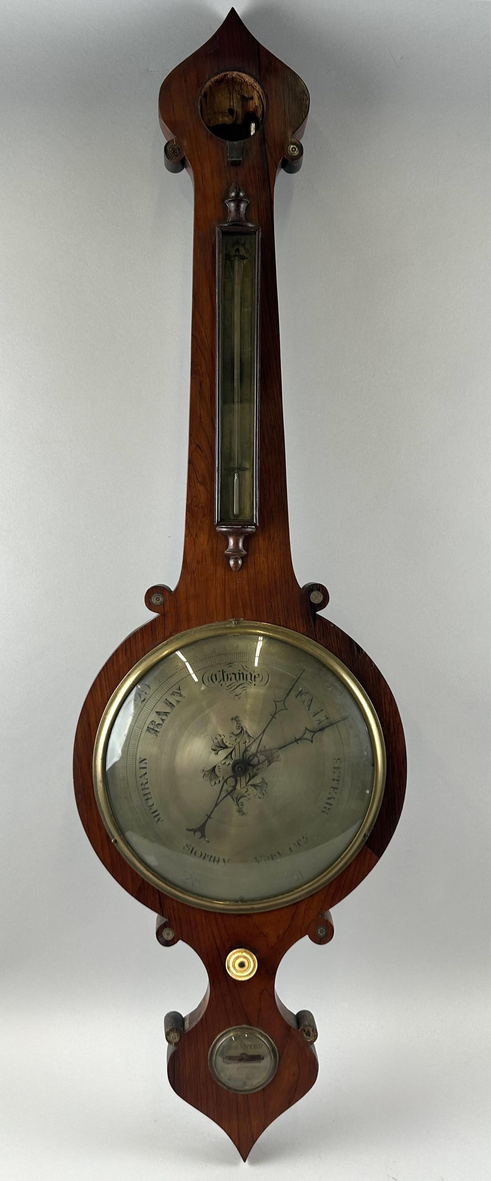 ENGLISH BAROMETER 19th Century Height 41.5".: ENGLISH BAROMETER19th CenturyRosewood case with mother-of-pearl appliqu?s and bone knob.Height 41.5".