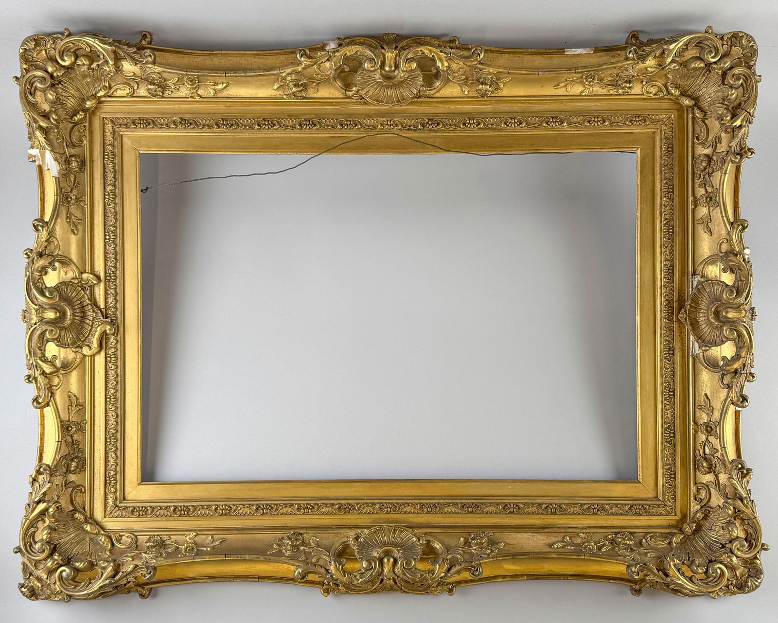 LARGE CONTINENTAL GILT PICTURE FRAME 19th Century 34" x 43". Aperture 19.75" x 29.75". Rabbet 20.25" (1 of 1)