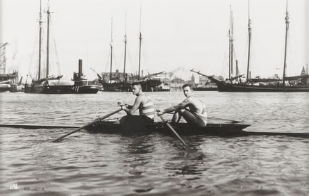 PHOTOGRAPH OF TWO SCULLERS IN A HARBOR Early 20th Century Silver gelatin print, 7.5" x 12" sight.