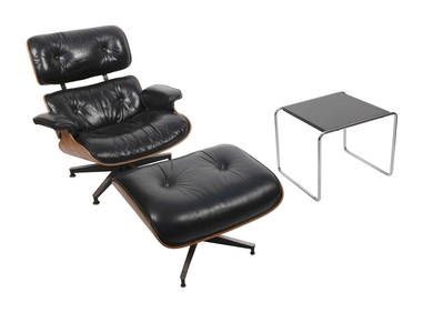 EAMES LOUNGE CHAIR AND OTTOMAN AND A NON-MATCHING SIDE TABLE Mid-20th Century Chair back height 32". (1 of 2)