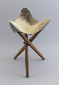 COWHIDE FIELD STOOL Mexico, Early 20th Century Height 20". Length across seat 13".