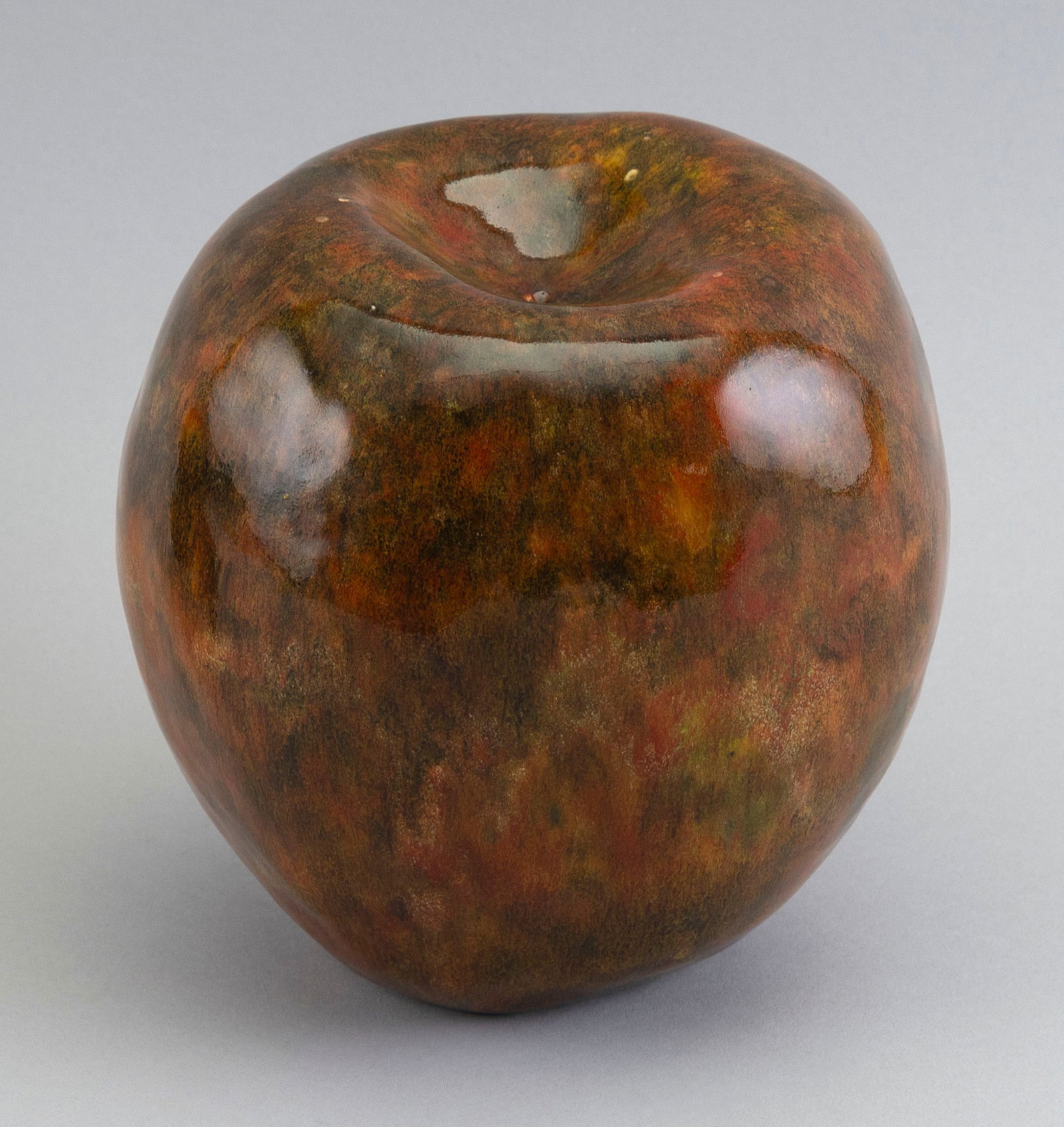 HANS HEDBERG (France/Sweden, 1917-2007), Apple., Glazed ceramic in shades of red, green and yellow,: HANS HEDBERGFrance/Sweden, 1917-2007Apple. Signed on underside "HH".Glazed ceramic in shades of red, green and yellow, height 7". Notes:After spending two years at the Istituto d'Arte della Ceramica i