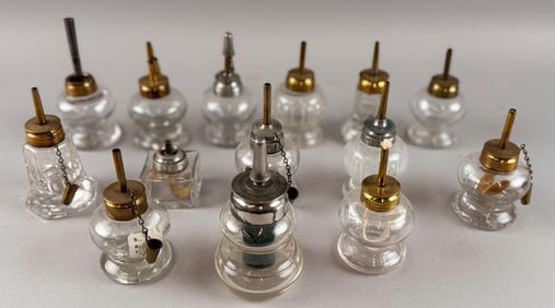 FOURTEEN CLEAR GLASS SPARKING LAMPS 19th Century Heights from 4" to 4.75".