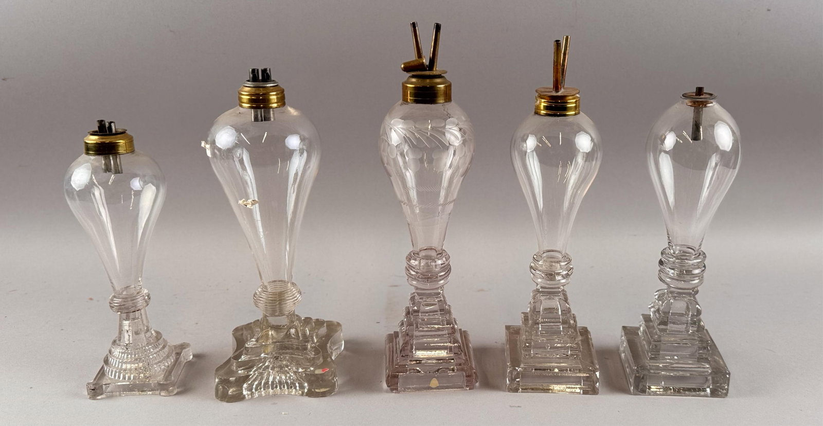 FIVE CLEAR BLOWN AND PRESSED GLASS LAMPS First Half of the 19th Century Heights from 9.75" to (1 of 5)