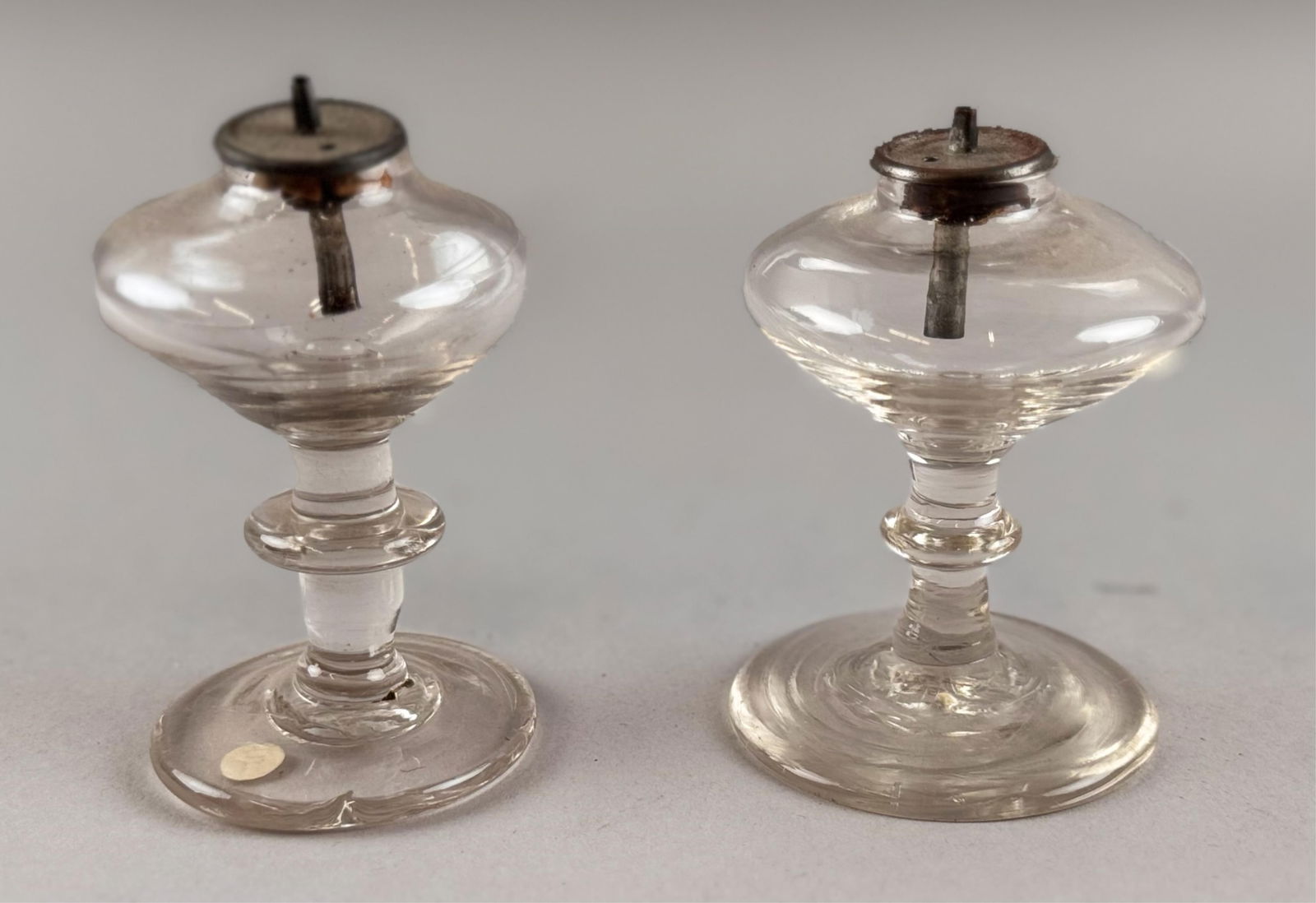 PAIR OF CLEAR BLOWN GLASS SPARKING LAMPS Early 19th Century Heights 3.25". (1 of 2)