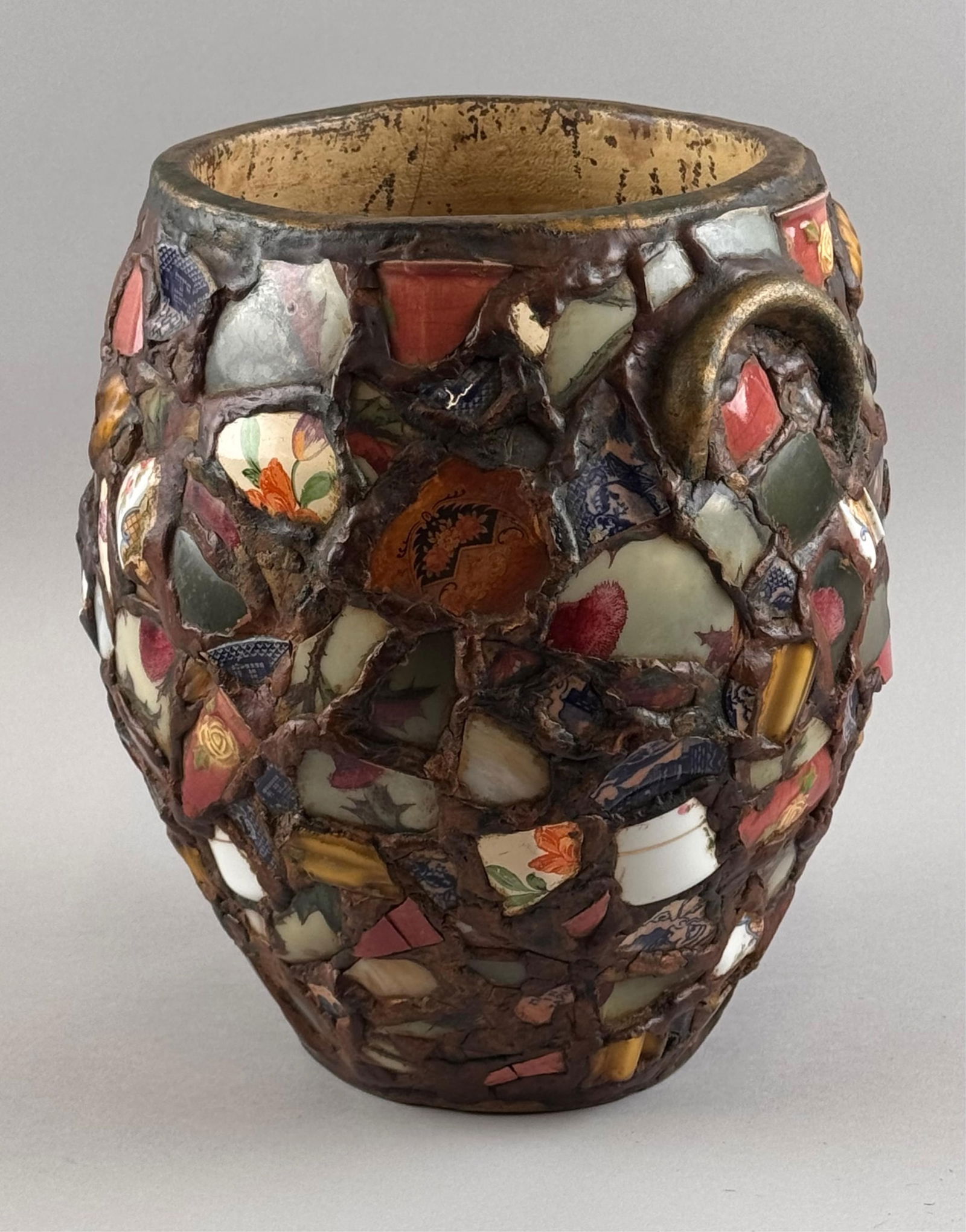 STONEWARE VESSEL OVERLAID WITH PORCELAIN FRAGMENTS Height 11.5".: STONEWARE VESSEL OVERLAID WITH PORCELAIN FRAGMENTSHeight 11.5".