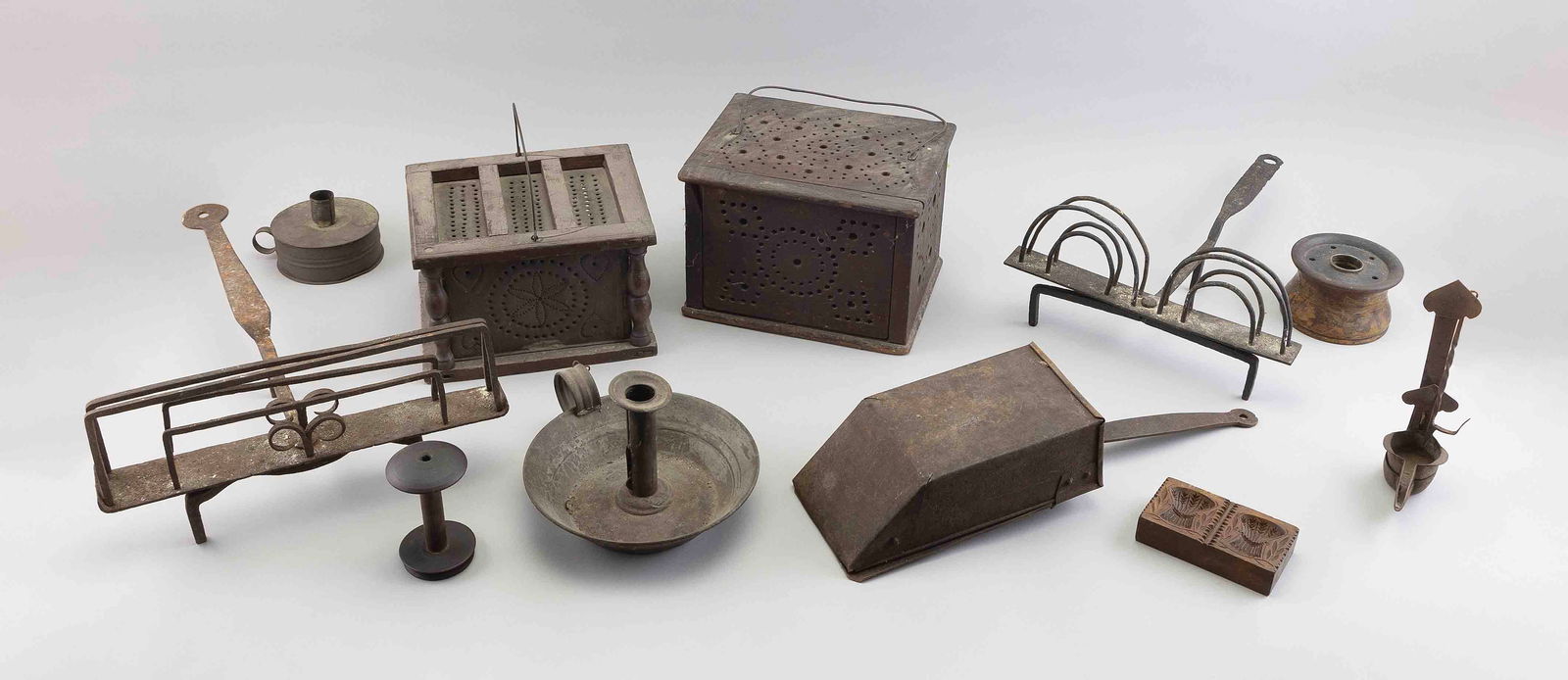 ELEVEN ANTIQUE HOUSEWARES Late 18th to Mid-19th Century Largest foot warmer height 7". Width 9.75". (1 of 1)