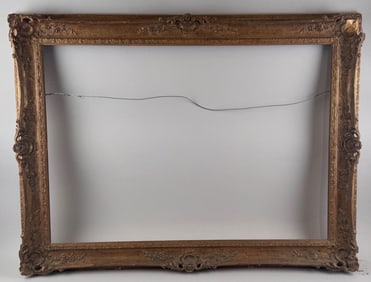 TWO MATCHING FRENCH-STYLE CARVED AND GILDED FRAMES Early 20th Century Apertures 23.5" x 33.5" and