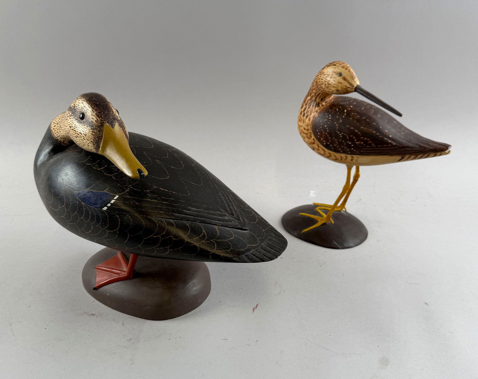 TWO CROWELL-STYLE BIRD CARVINGS Contemporary Lengths 7" and 13".: TWO CROWELL-STYLE BIRD CARVINGSContemporaryStamped "David B. Shuttleworth".Lengths 7" and 13".