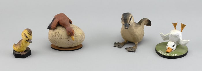 FOUR STAN SPARRE DUCKLING CARVINGS Falmouth, Massachusetts, 1922-2011 Heights from 2.5" to 3.5".