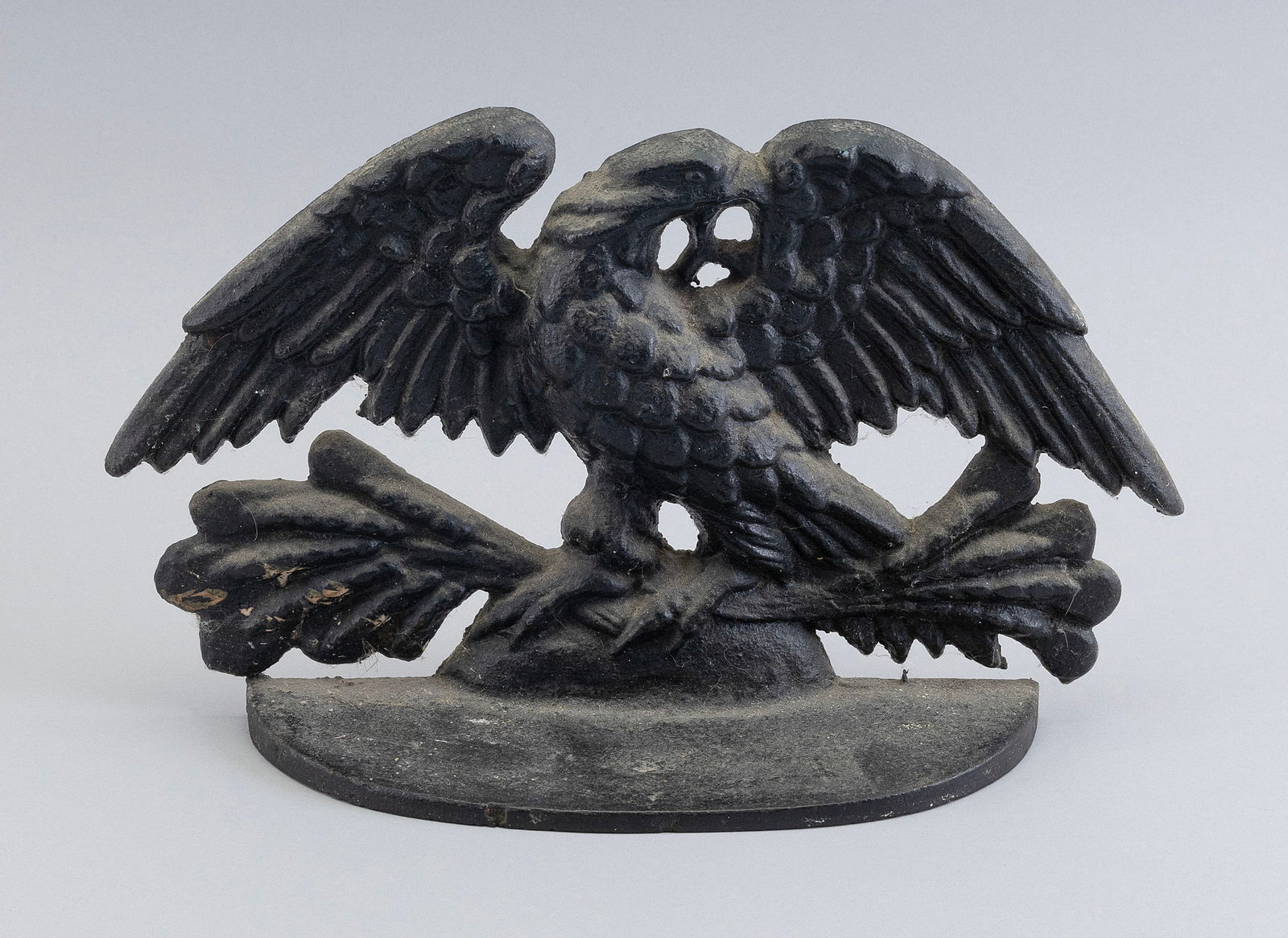 CAST IRON SPREAD-WING EAGLE DOORSTOP 19th Century Height 8". Width 12.25". (1 of 2)